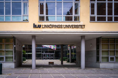 NORRKOPING, SWEDEN - JULY 27, 2021: Front facade view of Linkoping University campus, old yellow building in Norrkoping Sweden July 27, 2021.のeditorial素材