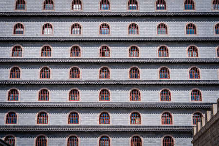 ALVKARLEBY, SWEDEN - AUGUST 3, 2021: Chinese architecture. Closeup front view of large building with many windows at Dragon Gate in Alvkarleby Sweden August 3, 2021.のeditorial素材