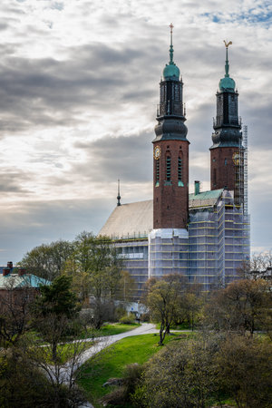 Beautiful vertical view of the famous Hogalid church on park hill in Stockholm Sweden.の写真素材