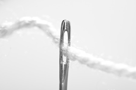 close-up thread a needle, black and white imageの写真素材