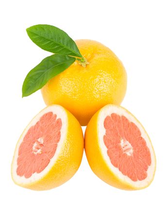 close-up ripe red grapefruits with leaves, isolated on whiteの写真素材