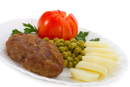 close-up meat rissole with vegetables, isolated on whiteの写真素材