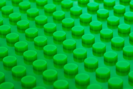 close-up green plastic construction backgroundの写真素材