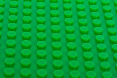 close-up green plastic construction backgroundの写真素材