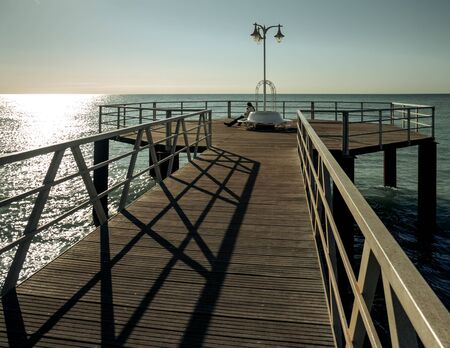 Wooden walkway over the sea in Xilxes, CastellÃ³n (Spain)の写真素材