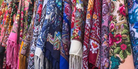 Russian colorful traditional scarfs for sale in a gift shopの写真素材