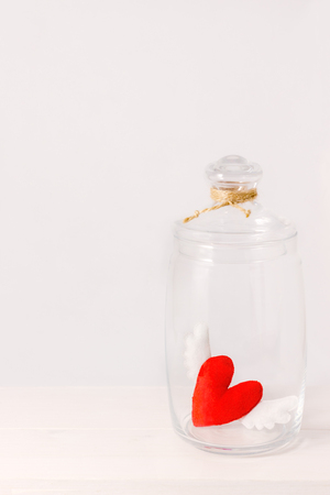 felt heart closed in glass jarの写真素材