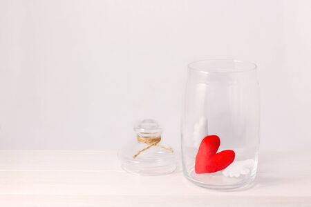 felt heart closed in glass jarの写真素材