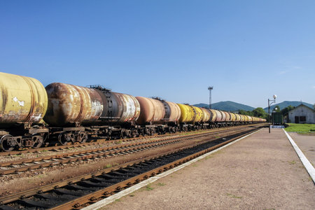 Freight trains.Railroad train of tanker cars transporting crude oil on the tracks.の写真素材