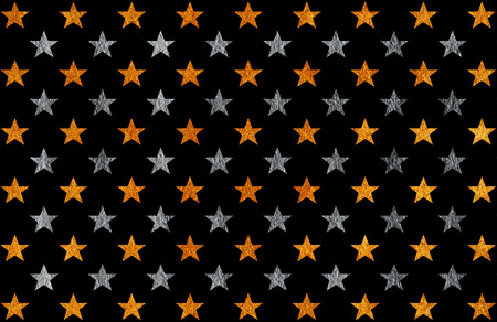 Golden and silver painted stars pattern. Golden and silver shining texture.の写真素材