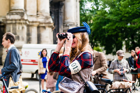 LVIV, UKRAINE - May, 2016: Batyars on Bicycles Lvivs Tweed Run or Retro Cruise.