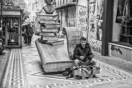 ISTANBUL, TURKEY - November, 2015: Street Life in the Asian part of Istanbul in the Kadikoy district. Shoeblack.のeditorial素材