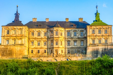 Pidhirtsi, Ukraine - July, 2017: Medieval Pidhirtsi Castle in sunset summer light, Pidhirtsi village, Lviv region Ukraineのeditorial素材