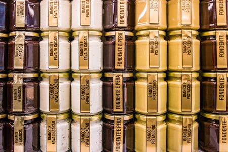 Venice, Italy - October, 2019: Jars with chocolate pattern.のeditorial素材