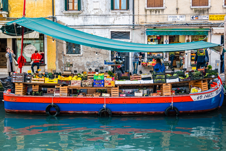 Venice, Italy - October, 2019: Floating fruit market in Venice Italyのeditorial素材