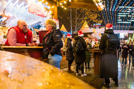 Berlin, Germany - December, 2019: Christmas market near Kaiser Wilhelm Memorial Church in the evening, Berlin, Germanyのeditorial素材