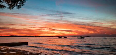 Evening scene with sunset on sea in Fazana, Istrian peninsula, Croatia.の写真素材