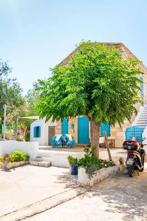 Symi, Greece - June 2021: Colorful house on the island of Simi, part of the Dodecanese island chain, Greece.のeditorial素材