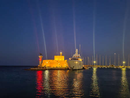 Agios Nikolaos fortress on Rhodes island at night, Greece.の写真素材