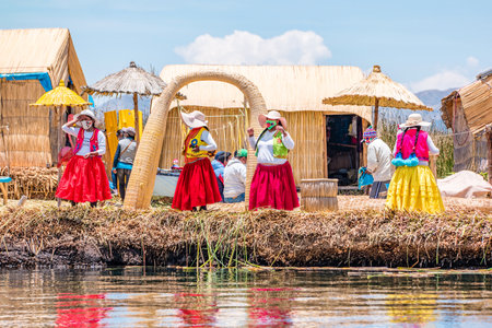 Uros, Peru - October 2021: People on the floating Uros Islands on Lake Titicaca in Peru.のeditorial素材