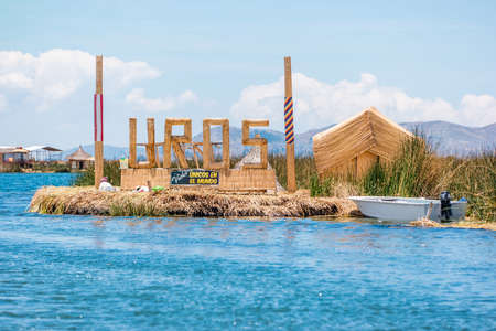 Uros, Peru - October 2021: People on the floating Uros Islands on Lake Titicaca in Peru.のeditorial素材
