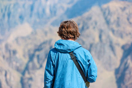 A tourist looks at the world's deepest canyon Colca in Peru.の写真素材