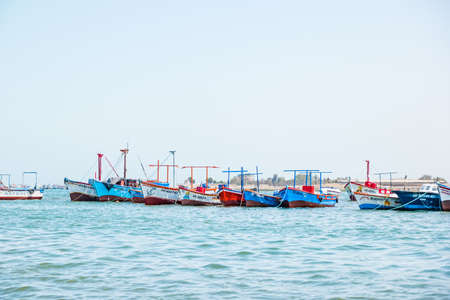 Paracas, Peru - October 2021: Multicolored boats in the bay of Paracas in Peru.のeditorial素材