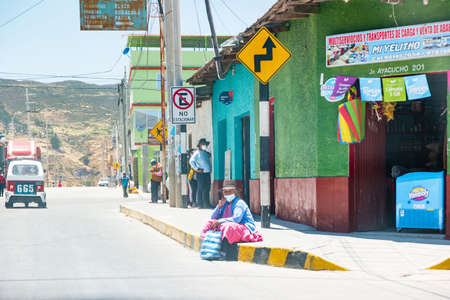 Puquio, Peru - October 2021: Daily llife on the streets of a typical small town in Peru.のeditorial素材