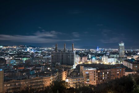 Barcelona at night, the city illuminated.の写真素材