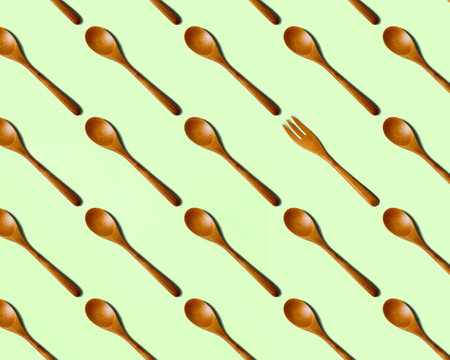 Illustration of wooden utensils. A lot of spoons and one forkの写真素材