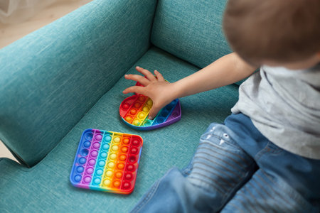 toy fidget, Child play with antistress toyの写真素材