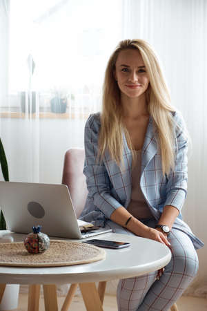 Portrait of a female psychologist or coach at the workplace, look at cameraの写真素材