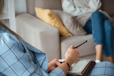 Impersonal consultation of a woman with a psychologist, care for mental healthの写真素材