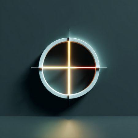 A glowing crosshair in a circular frame on a dark background, suggesting precision and focus.の素材