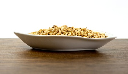 Side view of astragalus root in plateの写真素材