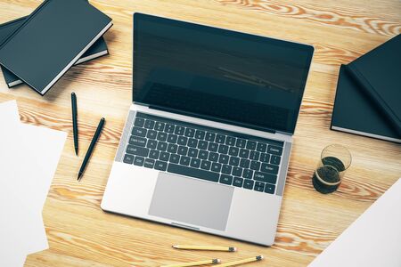 Top view of desktop with laptop and work accessories, mockup. 3D Renderingの写真素材