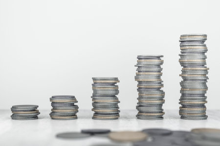 Growing stacks of coins, accumulation concept. 3D Rendering