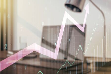 Multi exposure of abstract creative financial chart with upward arrow on laptop background, rise and breakthrough conceptの写真素材