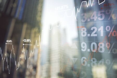 Double exposure of abstract financial diagram on office buildings background, banking and accounting conceptの写真素材