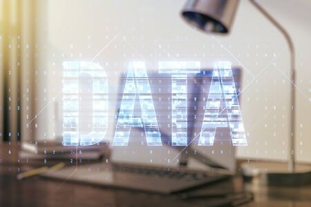Creative Data word hologram on modern laptop background, big data and blockchain concept. Multiexposureの写真素材