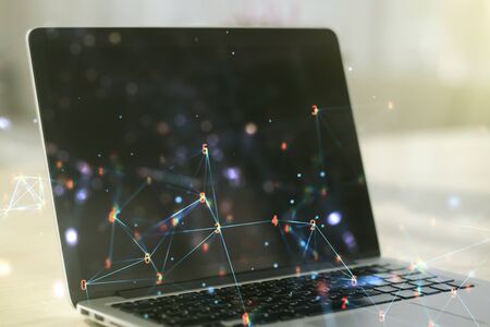 Creative abstract wireless technology hologram on modern computer background, artificial intelligence and machine learning concept. Multi exposureの写真素材