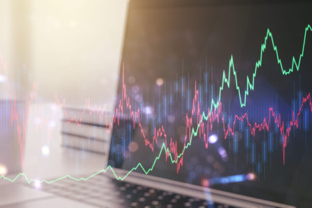Abstract creative financial graph on modern laptop background, financial and trading concept....