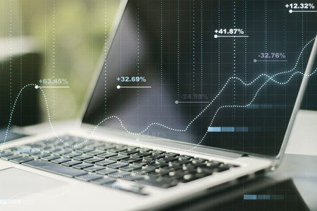 Double exposure of abstract creative statistics data hologram on computer background, analytics and...