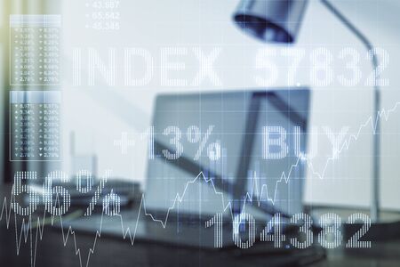 Abstract creative financial graph on modern laptop background, forex and investment concept. Multiexposureの写真素材