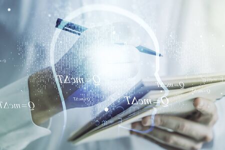 Creative artificial Intelligence concept with human head hologram and man hand writing in notebook on background. Multiexposureの写真素材