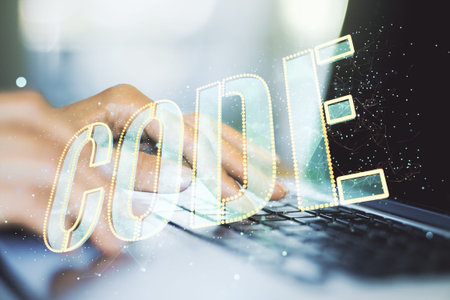 Creative Code word sign and hands typing on laptop on background, international software development...