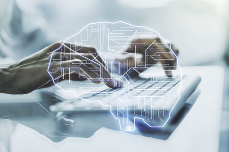 Creative artificial Intelligence concept with human brain hologram and hands typing on laptop on...