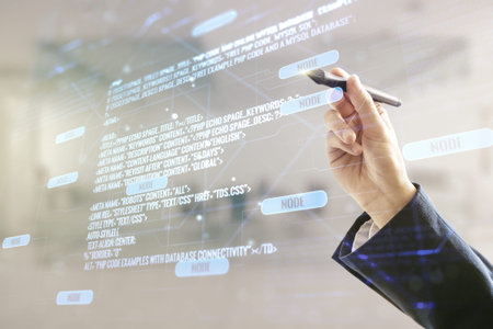 Double exposure of male hand with pen working with abstract programming language interface on...