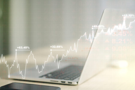 Double exposure of abstract creative financial diagram on modern laptop background, banking and...