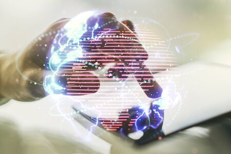 Double exposure of abstract digital world map with connections and hand working with a digital tablet on background, big data and blockchain conceptの写真素材